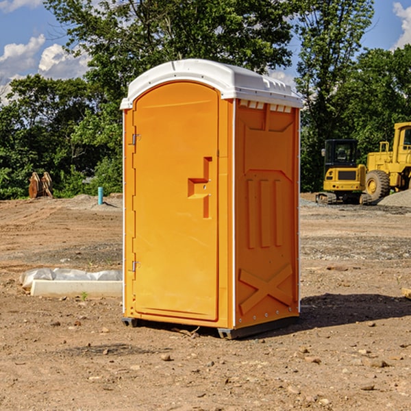 what is the cost difference between standard and deluxe porta potty rentals in Aneth